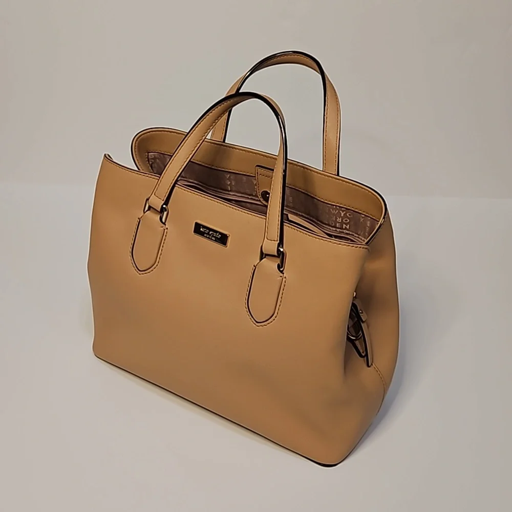 Kate Spade beige medium tote with adjustable crossbody. Includes matching wallet